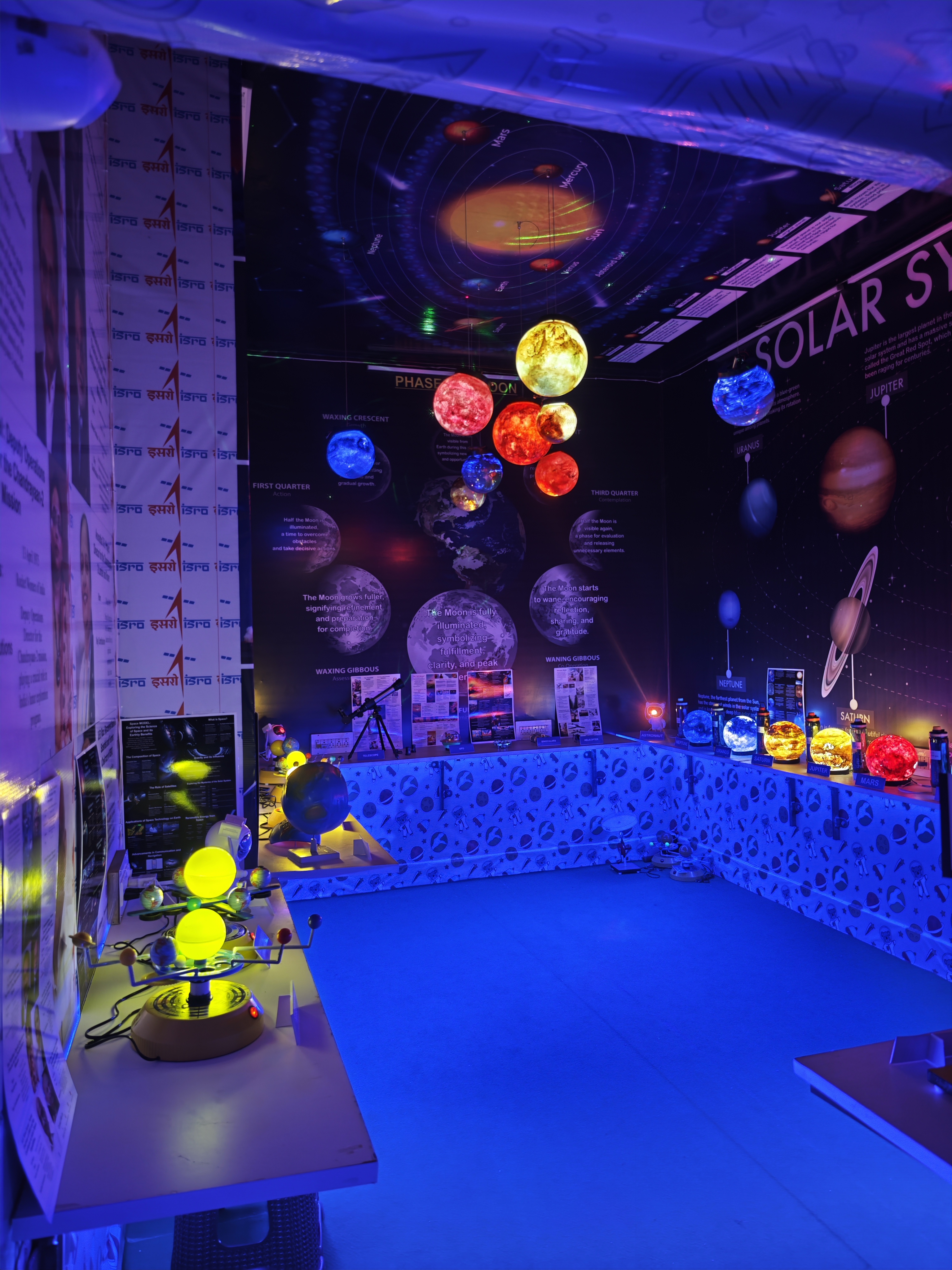 Astronomy lab with illuminated planet exhibits
